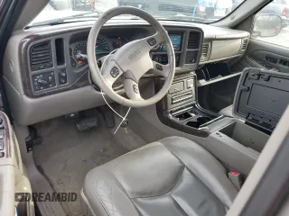 2005 GMC Yukon Denali z VIN 1GKEK63U65J262371, wystawiony jako Copart lot #52773425 z przebiegiem 129 028 mil mil oraz Czysty tytuł • Clean title. Historia ofert i sprzedaży dostępna na DreamBid. Obrazek 8.