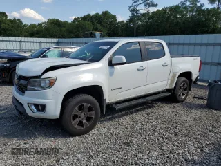 2015 Chevrolet Colorado 2WD Z71 with VIN 1GCGSCE33F1212441, listed as a Copart auction lot 58332155 with 200,938 mi miles and Salvage title. Bid and sale history available at DreamBid. Image 1.