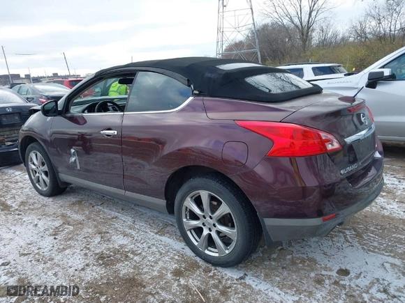 2014 Nissan Murano CrossCabriolet with VIN JN8AZ1FY0EW301566, listed as a IAAI auction lot 41006099 with 168,658 mi miles. Bid and sale history available at carsss.com. Image 3.