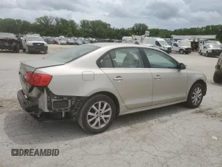 2014 Volkswagen Jetta SE with VIN 3VWD07AJ6EM209228, listed as a Copart auction lot 60500525 with 118,261 mi miles and Salvage title. Bid and sale history available at DreamBid. Image 3.