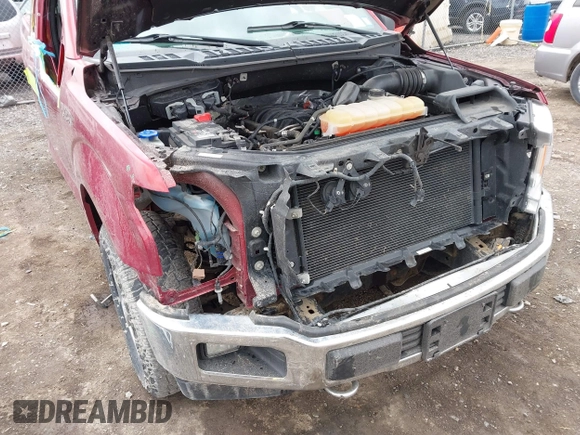 2018 Ford F-150 XL z VIN 1FTFX1E5XJFB66587, wystawiony jako IAAI lot #41870713 z przebiegiem 72 991 mil mil oraz . Historia ofert i sprzedaży dostępna na DreamBid. Obrazek 18.