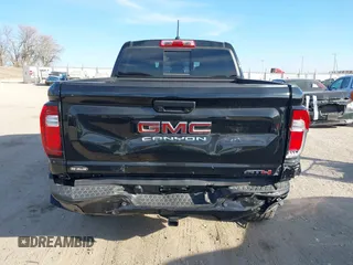 2024 GMC Canyon 4WD AT4 with VIN 1GTP6DEK9R1118926, listed as a IAAI auction lot 40998280 with 10,958 mi miles. Bid and sale history available at carsss.com. Image 16.