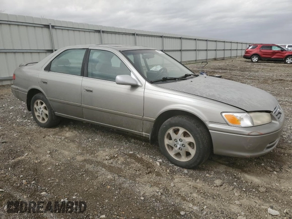 2000 Toyota Camry CE with VIN JT2BG22K6Y0471945, listed as a Copart auction lot 48932715 with Not Provided miles and Salvage Title. Bid and sale history available at DreamBid. Image 4.