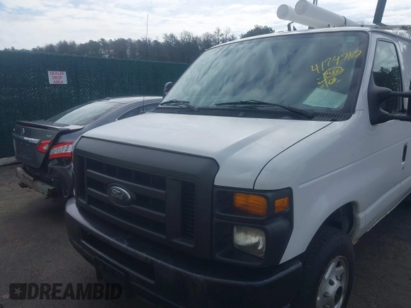 2012 Ford Econoline Cargo Commercial with VIN 1FTNE1EWXCDB38975, listed as a IAAI auction lot 41747167 with 331,484 mi miles and . Bid and sale history available at carsss.com. Image 6.