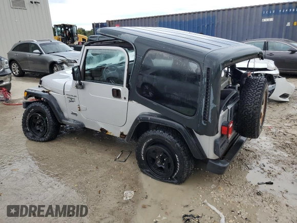 2002 Jeep Wrangler Sport with VIN 1J4FA49S32P733909, listed as a Copart auction lot 72776204 with 157,508 mi miles and Non Repairable. Bid and sale history available at carsss.com. Image 2.