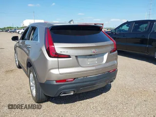 2023 Cadillac XT4 FWD Luxury with VIN 1GYAZAR4XPF116698, listed as a IAAI auction lot 40594015 with 18,368 mi miles. Bid and sale history available at carsss.com. Image 3.