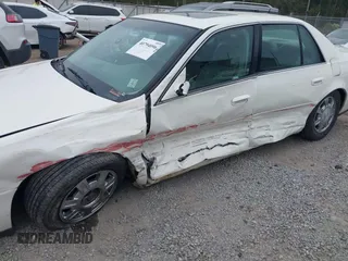 2005 Cadillac DeVille z VIN 1G6KD54Y75U162964, wystawiony jako IAAI lot #40794096 z przebiegiem 165 341 mil mil oraz . Historia ofert i sprzedaży dostępna na DreamBid. Obrazek 6.