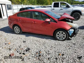 2014 Kia Rio LX with VIN KNADM4A37E6356601, listed as a Copart auction lot 71753504 with 166,142 mi miles and Salvage Title. Bid and sale history available at DreamBid. Image 4.