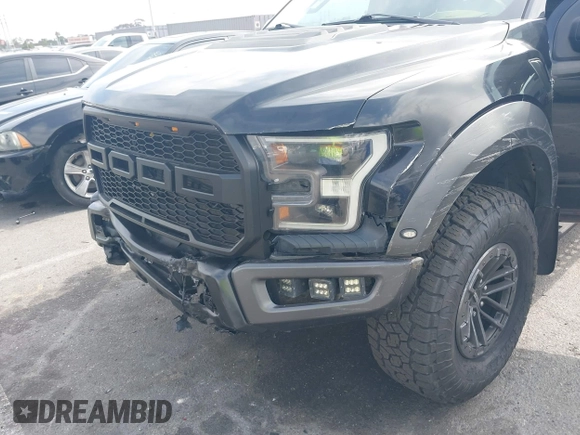2020 Ford F-150 Raptor with VIN 1FTFW1RG2LFA30858, listed as a IAAI auction lot 42192391 with 90,018 mi miles and . Bid and sale history available at carsss.com. Image 6.