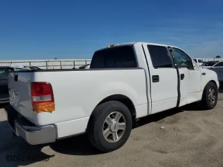 2007 Ford F-150 XLT with VIN 1FTPW12547KB84613, listed as a Copart auction lot 50031695 with 72,081 mi miles and Salvage Title. Bid and sale history available at carsss.com. Image 3.
