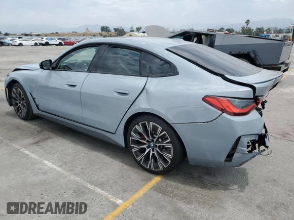 2022 BMW 4 Series 430i with VIN WBA63AV00NFM54895, listed as a Copart auction lot 59437215 with Not provided miles and Salvage title. Bid and sale history available at DreamBid. Image 2.