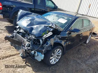 2015 Buick LaCrosse Leather with VIN 1G4GB5G30FF110697, listed as a IAAI auction lot 41331963 with 125,845 mi miles. Bid and sale history available at carsss.com. Image 2.