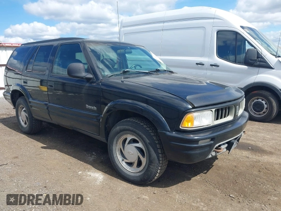 1997 Oldsmobile Bravada z VIN 1GHDT13W3V2707243, wystawiony jako IAAI lot #42024114 z przebiegiem 185 219 mil mil oraz . Historia ofert i sprzedaży dostępna na DreamBid. Obrazek 1.
