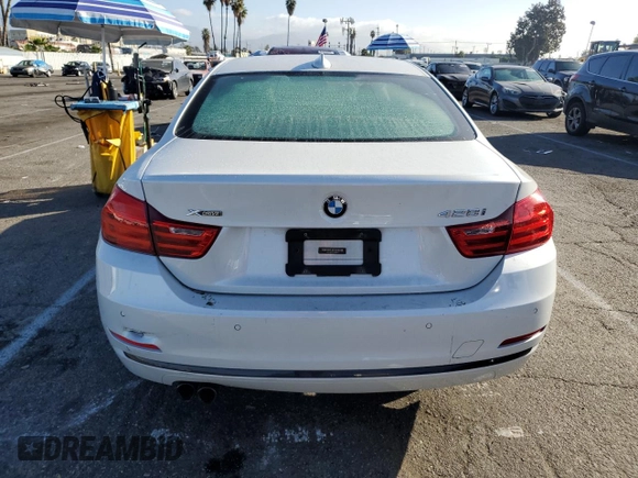 2016 BMW 4 Series 428i xDrive with VIN WBA3N9C57GK248610, listed as a Copart auction lot 84958044 with 62,485 mi miles and Salvage Title. Bid and sale history available at carsss.com. Image 6.