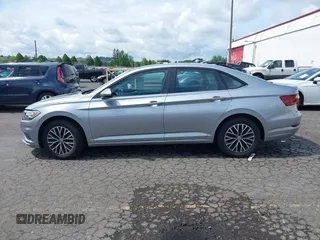 2019 Volkswagen Jetta S with VIN 3VWC57BU2KM215738, listed as a IAAI auction lot 42131376 with 52,720 mi miles and . Bid and sale history available at DreamBid. Image 14.