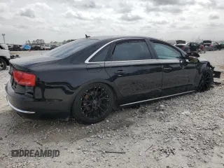 2014 Audi A8 3.0T z VIN WAURGAFD2EN002567, wystawiony jako Copart lot #48188395 z przebiegiem 159 477 mil mil oraz Szkody całkowita. Historia ofert i sprzedaży dostępna na DreamBid. Obrazek 3.