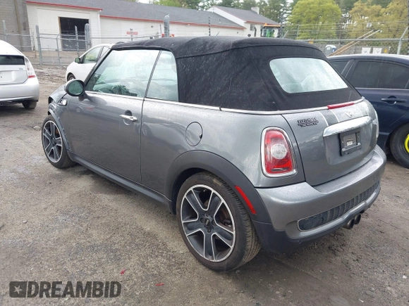 2010 MINI Convertible S with VIN WMWMS3C59ATY51392, listed as a IAAI auction lot 42192716 with 117,628 mi miles and . Bid and sale history available at DreamBid. Image 3.