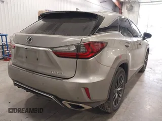 2017 Lexus RX 350 with VIN 2T2BZMCA5HC111179, listed as a IAAI auction lot 42115522 with 130,249 mi miles and . Bid and sale history available at DreamBid. Image 4.