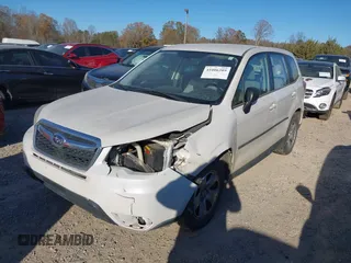 2014 Subaru Forester 2.5i with VIN JF2SJAAC4EG414600, listed as a IAAI auction lot 41006289 with 128,611 mi miles. Bid and sale history available at carsss.com. Image 17.