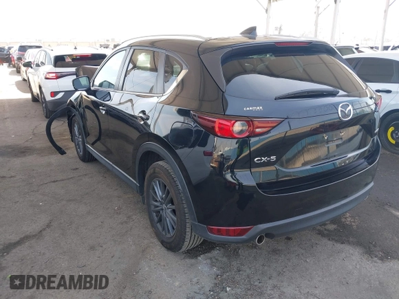 2020 Mazda CX-5 Touring with VIN JM3KFACM0L0804998, listed as a IAAI auction lot 41850998 with 44,519 mi miles. Bid and sale history available at carsss.com. Image 3.