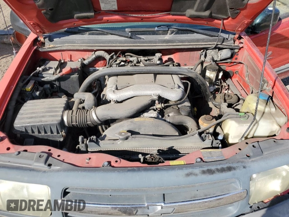 2004 Chevrolet Tracker ZR2 z VIN 2CNBJ734X46910549, wystawiony jako Copart lot #80849894 z przebiegiem Nie podano mil oraz Szkoda całkowita • Salvage title. Historia ofert i sprzedaży dostępna na DreamBid. Obrazek 12.