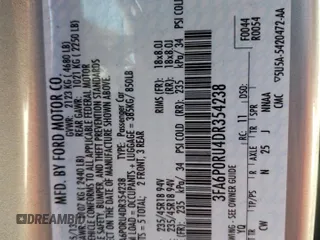 2013 Ford Fusion Titanium Hybrid with VIN 3FA6P0RU4DR354238, listed as a Copart auction lot 55414345 with 206,421 mi miles and Clean Title. Bid and sale history available at carsss.com. Image 12.