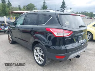 2013 Ford Escape Titanium with VIN 1FMCU9J98DUB02238, listed as a IAAI auction lot 42609782 with 168,574 mi miles and . Bid and sale history available at DreamBid. Image 3.