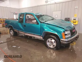 1993 GMC Sierra 1500 z VIN 2GTEK19K8P1562964, wystawiony jako Copart lot #86767744 z przebiegiem 237 615 mil mil oraz Czysty tytuł • Clean title. Historia ofert i sprzedaży dostępna na DreamBid. Obrazek 4.