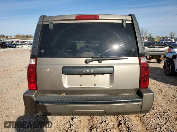 2006 Jeep Commander with VIN 1J8HH48K66C248620, listed as a Copart auction lot 51569855 with 254,667 mi miles and Salvage title. Bid and sale history available at DreamBid. Image 6.