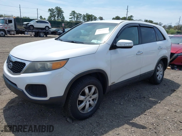 2011 Kia Sorento LX with VIN 5XYKTCA11BG180272, listed as a IAAI auction lot 42125073 with 137,156 mi miles and . Bid and sale history available at DreamBid. Image 2.