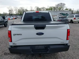 2016 Ford F-150 XLT with VIN 1FTEW1E84GKE18228, listed as a IAAI auction lot 41883297 with 147,018 mi miles. Bid and sale history available at carsss.com. Image 16.