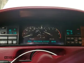 1992 Cadillac Eldorado z VIN 1G6EL13B8NU614555, wystawiony jako Copart lot #73767514 z przebiegiem 88 448 mil mil oraz Tytuł czysty. Historia ofert i sprzedaży dostępna na DreamBid. Obrazek 9.