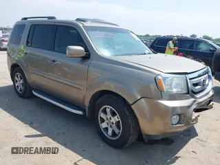 2009 Honda Pilot Touring z VIN 5FNYF38809B004142, wystawiony jako IAAI lot #42337103 z przebiegiem 152 874 mil mil oraz . Historia ofert i sprzedaży dostępna na DreamBid. Obrazek 1.