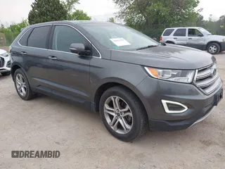 2015 Ford Edge Titanium z VIN 2FMTK3K96FBB48063, wystawiony jako IAAI lot #42421570 z przebiegiem 116 668 mil mil oraz . Historia ofert i sprzedaży dostępna na DreamBid. Obrazek 1.