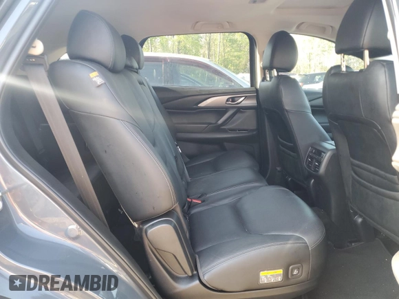 2023 Mazda CX-9 Touring z VIN JM3TCBCYXP0650893, wystawiony jako Copart lot #56875635 z przebiegiem 30 055 mil mil oraz Czysty tytuł • Clean title. Historia ofert i sprzedaży dostępna na DreamBid. Obrazek 11.