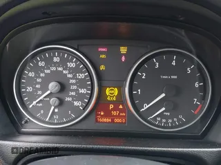 2006 BMW 3 Series 325xi with VIN WBAVD13526KV02817, listed as a IAAI auction lot 41772852 with 160,884 mi miles. Bid and sale history available at carsss.com. Image 7.