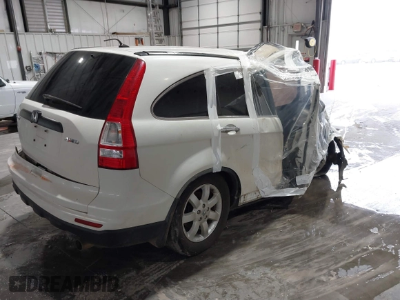 2011 Honda CR-V SE with VIN JHLRE4H49BC010599, listed as a IAAI auction lot 39483557 with 143,350 mi miles. Bid and sale history available at carsss.com. Image 4.
