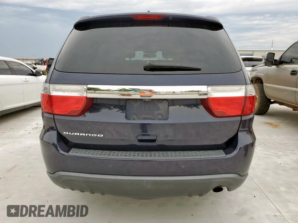 2013 Dodge Durango SXT z VIN 1C4RDHAG4DC685467, wystawiony jako Copart lot #60140355 z przebiegiem 173 752 mil mil oraz Czysty tytuł • Clean title. Historia ofert i sprzedaży dostępna na DreamBid. Obrazek 6.