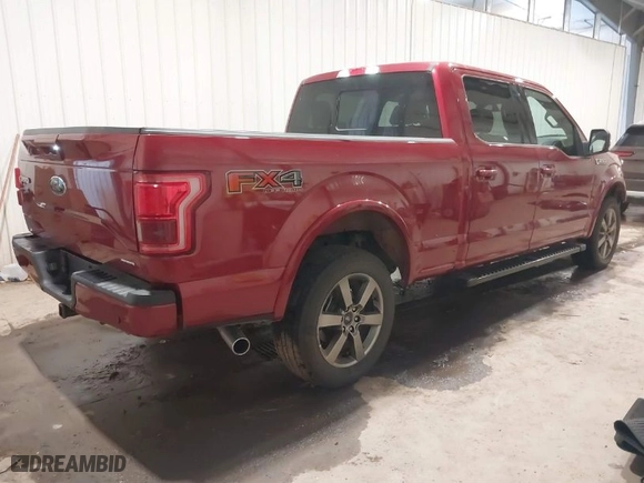2015 Ford F-150 XLT w/HD Payload Pkg with VIN 1FTFW1EF1FKD80880, listed as a IAAI auction lot 40958352 with 114,911 mi miles. Bid and sale history available at carsss.com. Image 4.