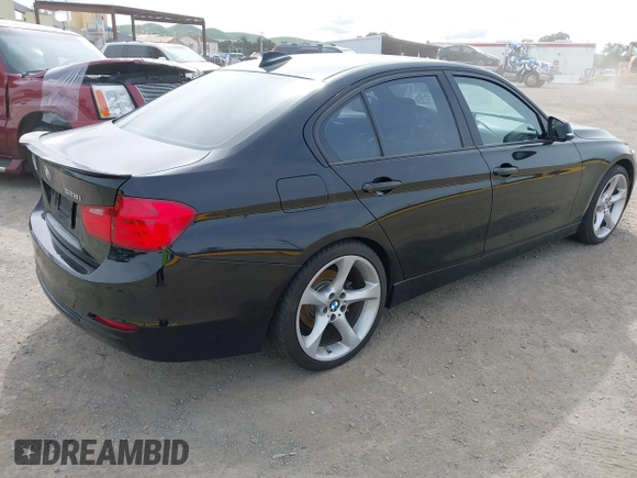 2012 BMW 3 Series 328i with VIN WBA3A5C56CF345904, listed as a IAAI auction lot 41992572 with 136,672 mi miles. Bid and sale history available at carsss.com. Image 4.
