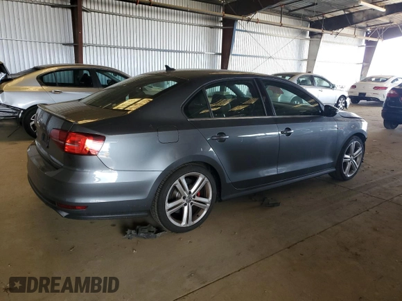 2017 Volkswagen Jetta GLI z VIN 3VW4T7AJ7HM327526, wystawiony jako Copart lot #52936635 z przebiegiem 41 036 mil mil oraz Szkoda całkowita • Salvage title. Historia ofert i sprzedaży dostępna na DreamBid. Obrazek 3.