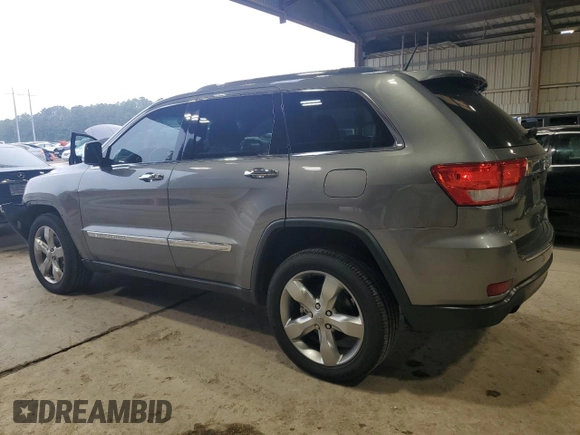 2013 Jeep Grand Cherokee Overland with VIN 1C4RJECT6DC526032, listed as a Copart auction lot 55660905 with 97,406 mi miles and Salvage Title. Bid and sale history available at DreamBid. Image 2.