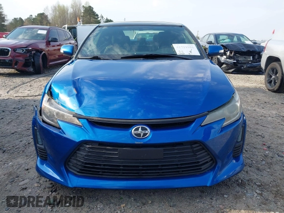 2014 Scion tC with VIN JTKJF5C72E3086001, listed as a IAAI auction lot 41721986 with 207,239 mi miles. Bid and sale history available at carsss.com. Image 12.