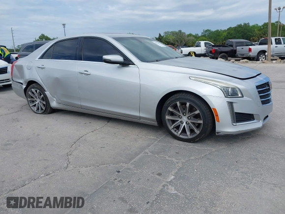 2016 Cadillac CTS with VIN 1G6AR5SS9G0194126, listed as a IAAI auction lot 41972437 with 129,742 mi miles and . Bid and sale history available at DreamBid. Image 1.