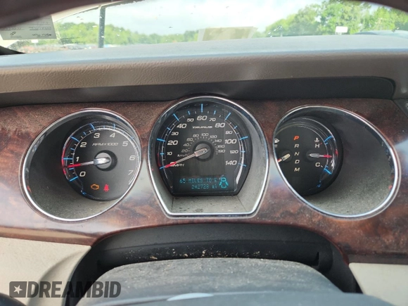 2010 Ford Taurus Limited with VIN 1FAHP2FW7AG138753, listed as a Copart auction lot 64880025 with 242,728 mi miles and Clean title. Bid and sale history available at DreamBid. Image 9.