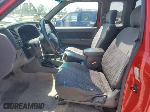 2000 Nissan Frontier XE z VIN 1N6ED26Y7YC392971, wystawiony jako Copart lot #61301035 z przebiegiem 182 149 mil mil oraz Czysty tytuł • Clean title. Historia ofert i sprzedaży dostępna na DreamBid. Obrazek 7.