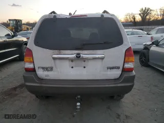 2003 Mazda Tribute LX with VIN 4F2YZ94133KM20084, listed as a Copart auction lot 82598104 with 216,848 mi miles and Salvage Title. Bid and sale history available at carsss.com. Image 6.
