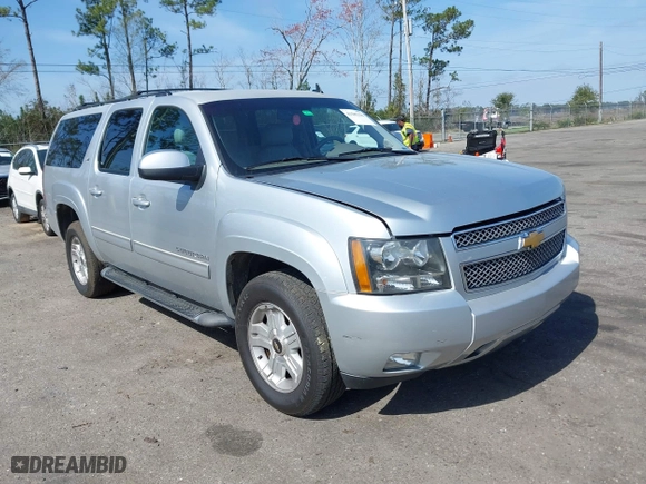 2013 Chevrolet Suburban LT with VIN 1GNSKJE71DR213143, listed as a IAAI auction lot 41585336 with 103,635 mi miles. Bid and sale history available at carsss.com. Image 1.