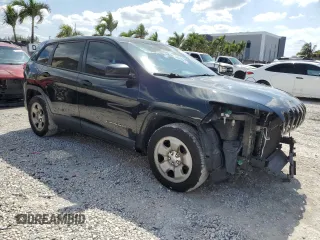 2014 Jeep Cherokee Sport with VIN 1C4PJLAB7EW123442, listed as a Copart auction lot 52294125 with 189,047 mi miles and Salvage Title. Bid and sale history available at DreamBid. Image 4.