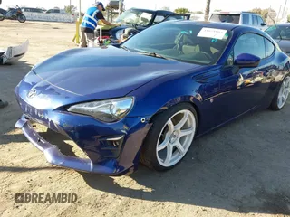 2017 Toyota 86 with VIN JF1ZNAA15H8706180, listed as a IAAI auction lot 41671003 with 98,793 mi miles. Bid and sale history available at carsss.com. Image 2.